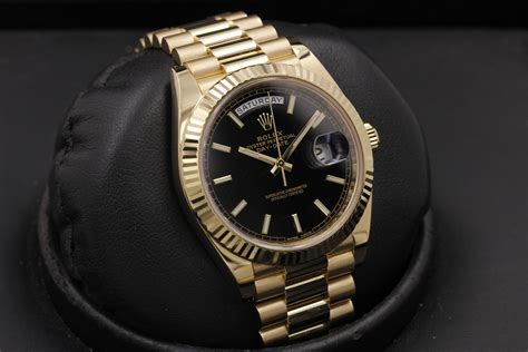 rolex day date gold schwarz preis|Rolex Day-Date price list.